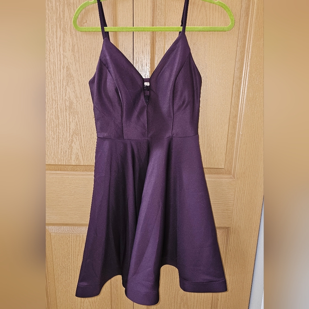 Plum Spaghetti Strap Dress with little flare to bottom.